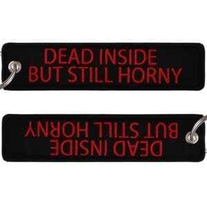 Pendant Dead Inside But Still Horny - black fabric moto key accessory with contrasting lettering