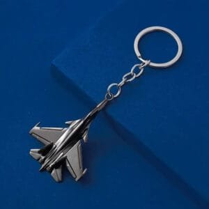 Key rings in steel in the shape of a fighter jet