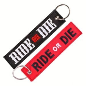 Ride Or Die Pendant - black material engraved with "RIDE OR DIE", a sturdy accessory for motorcycle keys.