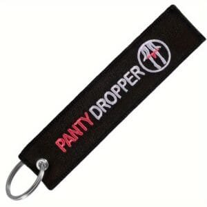 Panty Dropper - black material with red and white lettering and a circular logo with red underpants.