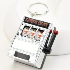 Slot machine keyring with lever and fruit symbols