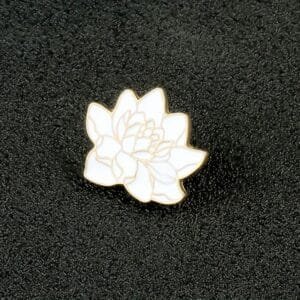 Pin with lotus flower, enamelled silver badge with symbolic design