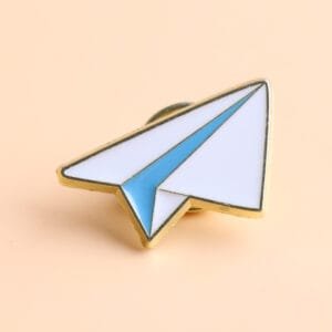 metal badge paper airplane