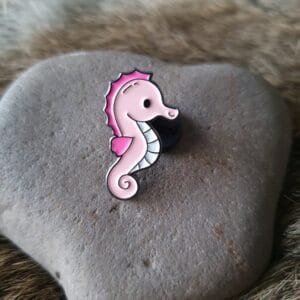Pastel pink sea horse with bright pink fins and white belly enamel pin sea animals summer style