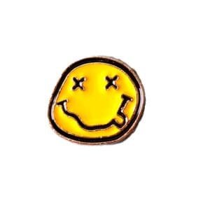 Yellow grunge smiley face with crosses instead of eyes Nirvana logo enamel pin rock music