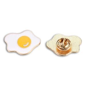 Egg enamel pin front and back with butterfly-shaped metal clasp with gold outline