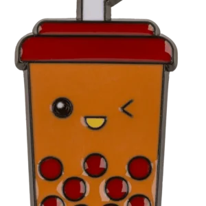 Kawaii bubble tea pin—an enamel pin featuring a sparkling boba drink with a straw, red pearls, and an orange cup on a dark background