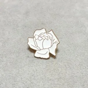 Lotus Flower Brooch – a white enamel flower with a gold outline